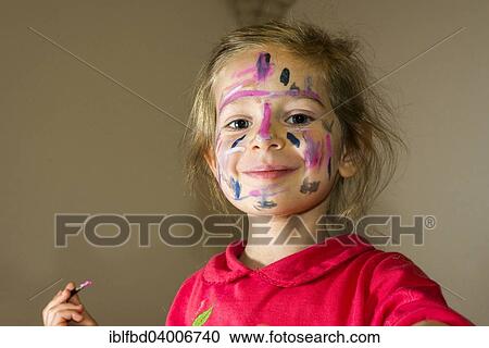 "Girl painting her face with colourful watercolour, Germany, Europe" View Large Photo Image Stock Image - "Girl painting her face with colourful watercolour, Germany, Europe". Fotosearch