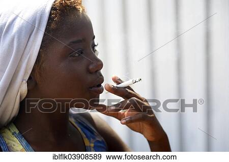 "Girl, street child, smoking a cigarette, Rio de Janeiro, Rio de Janeiro State, Brazil, South America" View Large Photo Image Stock Photo - "Girl, street child, smoking a cigarette, Rio de Janeiro, Rio de Janeiro State, Brazil, South America". Fotosearch