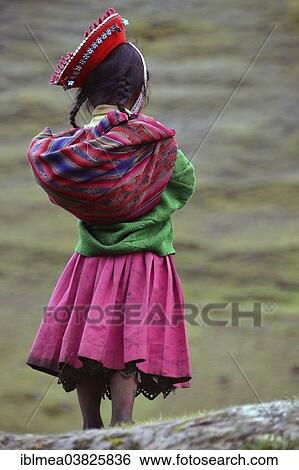 "Girl wearing traditional costume, rear view, Andes, near Cusco, Peru, South America" View Large Photo Image Stock Photograph - "Girl wearing traditional costume, rear view, Andes, near Cusco, Peru, South America". Fotosearch