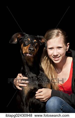 Girl with a Doberman View Large Photo Image Stock Photo - Girl with a Doberman. Fotosearch