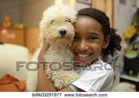 "Girl with a poodle in a slum or favela, Jacarezinho favela, Rio de Janeiro, Rio de Janeiro State, Brazil, South America" View Large Photo Image Stock Photo - "Girl with a poodle in a slum or favela, Jacarezinho favela, Rio de Janeiro, Rio de Janeiro State, Brazil, South America". Fotosearch