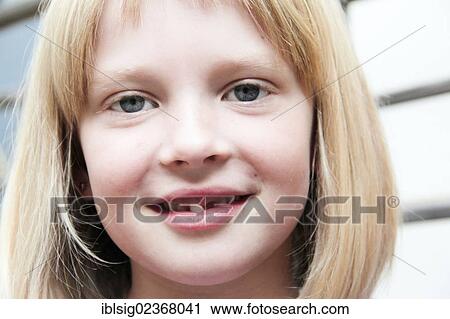 Girl with a tooth gap View Large Photo Image Stock Image - Girl with a tooth gap. Fotosearch