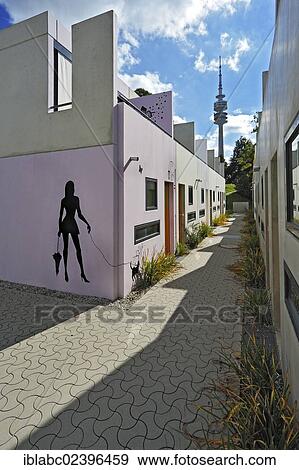 "Girl with an umbrella and a dog, mural in the former Olympic Village, Munich, Bavaria, Germany, Europe" View Large Photo Image Stock Photo - "Girl with an umbrella and a dog, mural in the former Olympic Village, Munich, Bavaria, Germany, Europe". Fotosearch
