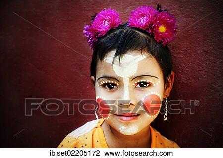 "Girl with flowers in her hair, her face is painted with Thanaka cream, Bagan, Burma, Myanmar, Southeast Asia, Asia" View Large Photo Image Stock Image - "Girl with flowers in her hair, her face is painted with Thanaka cream, Bagan, Burma, Myanmar, Southeast Asia, Asia". Fotosearch