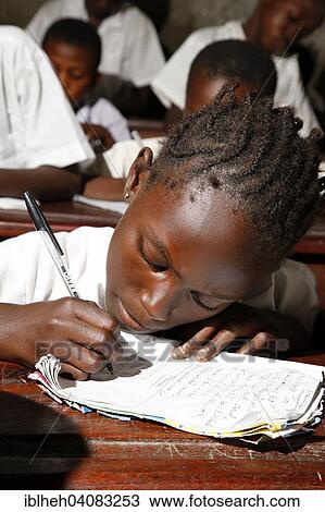 "Girl writing, school children in school uniform during class, Kinshasa, Congo, Africa" View Large Photo Image Stock Image - "Girl writing, school children in school uniform during class, Kinshasa, Congo, Africa". Fotosearch