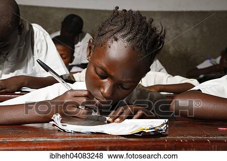 "Girl writing, school children in school uniform during class, Kinshasa, Congo, Africa" View Large Photo Image Stock Photo - "Girl writing, school children in school uniform during class, Kinshasa, Congo, Africa". Fotosearch