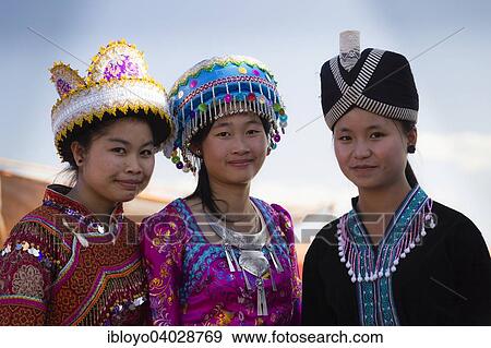 "Girls dressed in traditional Hmong costumes, Hmong New Year's Celebration, Phonsavan, Xiangkhouang, Laos, Asia" View Large Photo Image Stock Photo - "Girls dressed in traditional Hmong costumes, Hmong New Year's Celebration, Phonsavan, Xiangkhouang, Laos, Asia". Fotosearch