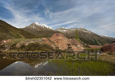 Stock Image - "Glacial fluting of Gepatschferner glacier, Mountains Ochsenkopf and Gratfernerkoepfe at back, Kaunertal Glacier, Kaunertal Valley, Oetztal Alps, Tyrol, Austria, Europe". Fotosearch
