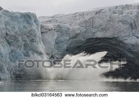 "Glacial ice avalanche at the glacial portal of Samarinbreen Glacier, Samarinvagen, Hornsund, Spitsbergen Island, Svalbard Archipelago, Svalbard and Jan Mayen, Norway, Europe" View Large Photo Image Stock Image - "Glacial ice avalanche at the glacial portal of Samarinbreen Glacier, Samarinvagen, Hornsund, Spitsbergen Island, Svalbard Archipelago, Svalbard and Jan Mayen, Norway, Europe". Fotosearch
