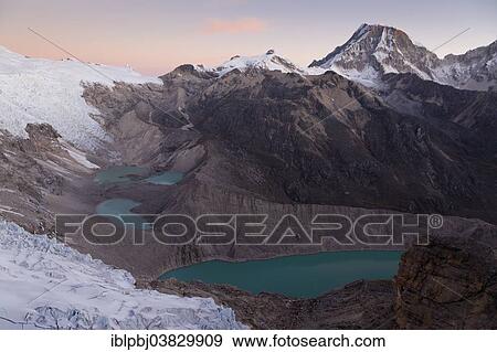 "Glacial lakes at Mt Nevado Tocllaraju, peaks of the Cordillera Blanca, at dusk, Peru, South America" View Large Photo Image Stock Photo - "Glacial lakes at Mt Nevado Tocllaraju, peaks of the Cordillera Blanca, at dusk, Peru, South America". Fotosearch