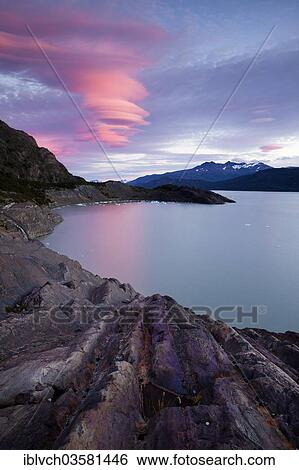 "Glacial striations on rock surface, with Grey Lake in back at sunset, Torres del Paine National Park, Chile, South America" View Large Photo Image Stock Photograph - "Glacial striations on rock surface, with Grey Lake in back at sunset, Torres del Paine National Park, Chile, South America". Fotosearch