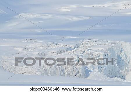 "Glacier emerges from the snow, Isfjorden, Spitsbergen Island, Svalbard Archipelago, Svalbard and Jan Mayen, Norway, Europe" View Large Photo Image Stock Photograph - "Glacier emerges from the snow, Isfjorden, Spitsbergen Island, Svalbard Archipelago, Svalbard and Jan Mayen, Norway, Europe". Fotosearch