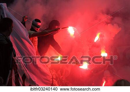 "Gladbach fans lighting firecrackers, FSV Mainz 05 - Borussia Moenchengladbach, in the Coface Arena, Mainz, Rhineland-Palatinate, Germany, Europe" View Large Photo Image Stock Image - "Gladbach fans lighting firecrackers, FSV Mainz 05 - Borussia Moenchengladbach, in the Coface Arena, Mainz, Rhineland-Palatinate, Germany, Europe". Fotosearch