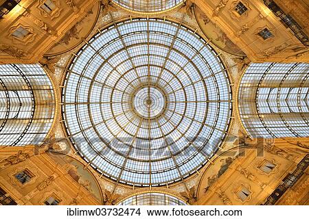 "Glass dome over the octagon, luxury shopping arcade, roofed gallery of Galleria Vittorio Emanuele II, twilight shot at the blue hour, Milan, Lombardy, Italy, Europe" View Large Photo Image Picture - "Glass dome over the octagon, luxury shopping arcade, roofed gallery of Galleria Vittorio Emanuele II, twilight shot at the blue hour, Milan, Lombardy, Italy, Europe". Fotosearch