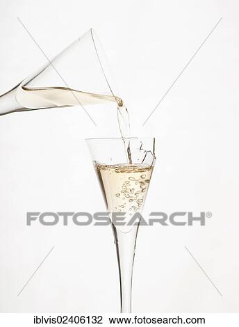 Glass filling up a broken glass with spirits View Large Photo Image Stock Image - Glass filling up a broken glass with spirits. Fotosearch