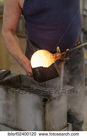 Stock Image - "Glassblower at work, Ruegen, Mecklenburg-Western Pomerania, Germany, Europe". Fotosearch