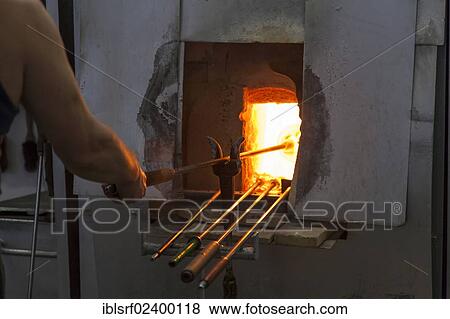 Stock Photo - "Glassblower at work, Ruegen, Mecklenburg-Western Pomerania, Germany, Europe". Fotosearch