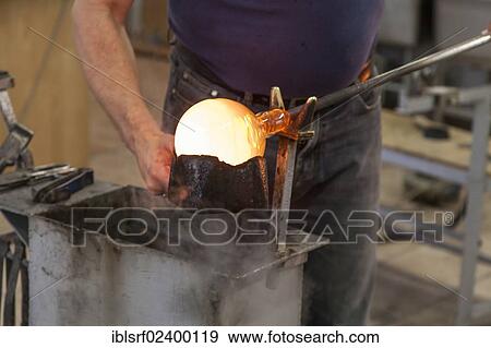 Stock Photo - "Glassblower at work, Ruegen, Mecklenburg-Western Pomerania, Germany, Europe". Fotosearch