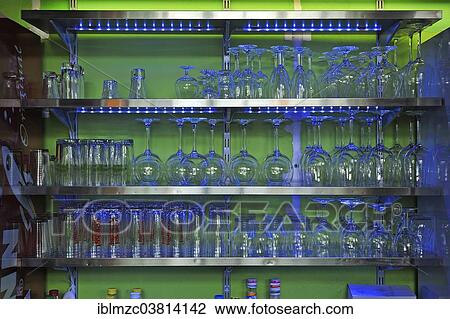 Glasses on a shelf View Large Photo Image Stock Image - Glasses on a shelf. Fotosearch