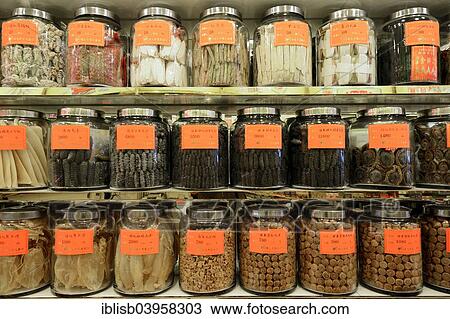 "Glasses with dried marine animals such as sea cucumbers, snails and mussels in a typical pharmacy for Traditional Chinese Medicine, Kowloon, Hong Kong, China, Asia" View Large Photo Image Stock Image - "Glasses with dried marine animals such as sea cucumbers, snails and mussels in a typical pharmacy for Traditional Chinese Medicine, Kowloon, Hong Kong, China, Asia". Fotosearch
