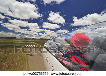 Stock Photograph - "Glider being towed for launch, Karoo, Free State Province, South Africa, Africa". Fotosearch