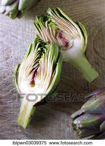 "Globe artichokes (Cynara cardunculus), cut" View Large Photo Image Stock Photography - "Globe artichokes (Cynara cardunculus), cut". Fotosearch