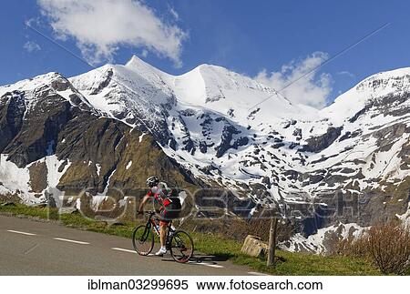 "Glockner Group with Sonnenwelleck Mountain and Fuschlkarkopf Mountain, cyclists on Grossglockner High Alpine Road, High Tauern National Park, Salzburg State, Austria, Europe" View Large Photo Image Stock Photography - "Glockner Group with Sonnenwelleck Mountain and Fuschlkarkopf Mountain, cyclists on Grossglockner High Alpine Road, High Tauern National Park, Salzburg State, Austria, Europe". Fotosearch