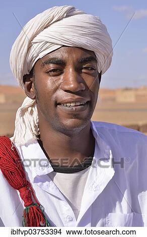 "Gnaoua musician with a turban, Merzouga, Meknes-Tafilalet region, Morocco, Africa" View Large Photo Image Picture - "Gnaoua musician with a turban, Merzouga, Meknes-Tafilalet region, Morocco, Africa". Fotosearch