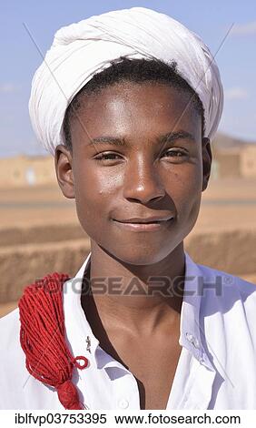 "Gnaoua musician with a turban, Merzouga, Meknes-Tafilalet region, Morocco, Africa" View Large Photo Image Stock Photography - "Gnaoua musician with a turban, Merzouga, Meknes-Tafilalet region, Morocco, Africa". Fotosearch