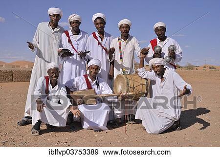 "Gnaoua musicians, Merzouga, Meknes-Tafilalet region, Morocco, Africa" View Large Photo Image Stock Photo - "Gnaoua musicians, Merzouga, Meknes-Tafilalet region, Morocco, Africa". Fotosearch