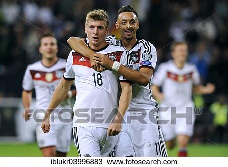 Stock Image - "Goal celebration, Toni Kroos and Karim Bellarabi, GER, qualifying game for the UEFA Euro 2016, Germany 1 - Ireland 1, Veltins-Arena, Gelsenkirchen, North Rhine-Westphalia, Germany, Europe". Fotosearch