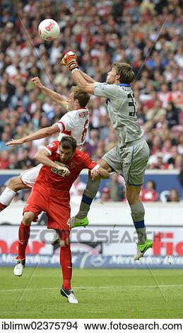 "Goalkeeper Fabian Giefer of Fortuna Duesseldorf thwarting chance by Georg Niedermeier of VfB Stuttgart, Mercedes-Benz Arena, Stuttgart, Baden-Wuerttemberg, Germany, Europe" View Large Photo Image Picture - "Goalkeeper Fabian Giefer of Fortuna Duesseldorf thwarting chance by Georg Niedermeier of VfB Stuttgart, Mercedes-Benz Arena, Stuttgart, Baden-Wuerttemberg, Germany, Europe". Fotosearch