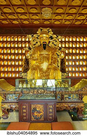 "God of Wealth sculpture in the Giant Wild Goose Pagoda, Xi'an, Shaanxi Province, China, Asia" View Large Photo Image Stock Photography - "God of Wealth sculpture in the Giant Wild Goose Pagoda, Xi'an, Shaanxi Province, China, Asia". Fotosearch