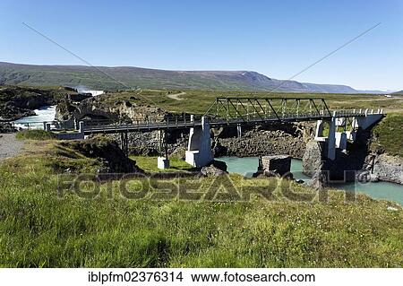 "Godafoss waterfall and bridge over Skjalfandafljot River, Iceland, Europe" View Large Photo Image Picture - "Godafoss waterfall and bridge over Skjalfandafljot River, Iceland, Europe". Fotosearch
