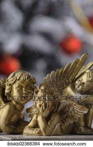 Golden angels in a Christmas ambience View Large Photo Image Picture - Golden angels in a Christmas ambience. Fotosearch