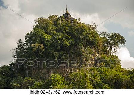 Stock Image - "Golden chedi on a hill, temple and monastery of Wat Phra Archa Thong or Golden Horse Temple, Mae Chan, Chiang Rai Province, Northern Thailand, Thailand, Asia". Fotosearch