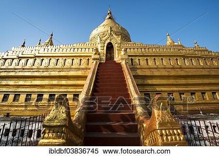 "Golden chedi, red staircase, Shwezigon Pagoda or Shwezigon Paya, Nyaung U, Mandalay Region, Myanmar, Asia" View Large Photo Image Stock Photography - "Golden chedi, red staircase, Shwezigon Pagoda or Shwezigon Paya, Nyaung U, Mandalay Region, Myanmar, Asia". Fotosearch