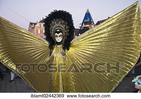 Stock Photo - "Golden costume, Venetian Fair, on the historic Marktplatz market square, Ludwigsburg, Baden-Wuerttemberg, Germany, Europe". Fotosearch
