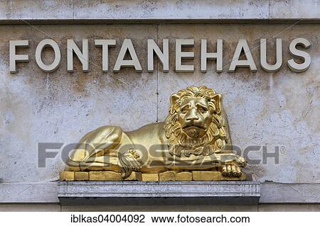 Stock Image - "Golden lion and lettering """"Fontanehaus"""" at the birthplace of the writer Theodor Fontane, Neuruppin, Ostprignitz-Ruppin, Brandenburg, Germany, Europe". Fotosearch