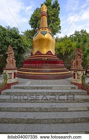 "Golden pagoda in the outdoor area of ​​the Buddhist monastery Brahma Vihara, Banjar, North Bali, Bali, Indonesia, Asia" View Large Photo Image Stock Photography - "Golden pagoda in the outdoor area of ​​the Buddhist monastery Brahma Vihara, Banjar, North Bali, Bali, Indonesia, Asia". Fotosearch