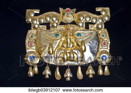 "Golden pre-Columbian Inca mask, replica, sheet brass with semi-precious stones, souvenir, Cusco, Peru, South America" View Large Photo Image Stock Photo - "Golden pre-Columbian Inca mask, replica, sheet brass with semi-precious stones, souvenir, Cusco, Peru, South America". Fotosearch
