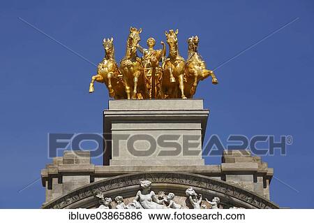 Stock Photograph - "Golden Quadriga de l'Aurora at the fountain Font de la Cascada, Parc de la Ciutadella, Barcelona, â€‹â€‹Catalonia, Spain, Europe". Fotosearch