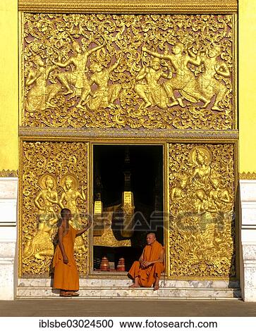 "Golden reliefs, monks at the entrance to the Carriage House, Wat Xieng Tong or Vat Xienthong, Luang Prabang, Luang Prabang Province, Laos, Asia" View Large Photo Image Stock Image - "Golden reliefs, monks at the entrance to the Carriage House, Wat Xieng Tong or Vat Xienthong, Luang Prabang, Luang Prabang Province, Laos, Asia". Fotosearch