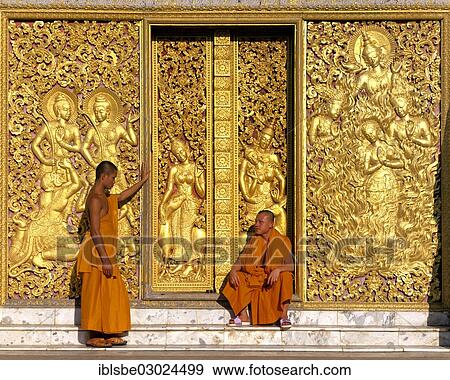 "Golden reliefs, monks at the entrance to the Carriage House, Wat Xieng Tong or Vat Xienthong, Luang Prabang, Luang Prabang Province, Laos, Asia" View Large Photo Image Stock Photo - "Golden reliefs, monks at the entrance to the Carriage House, Wat Xieng Tong or Vat Xienthong, Luang Prabang, Luang Prabang Province, Laos, Asia". Fotosearch