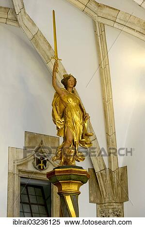 Stock Photography - "Golden statue of Lady Justice, New Town Hall, Marienplatz, Munich, Upper Bavaria, Bavaria, Germany, Europe". Fotosearch