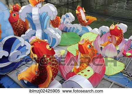 Stock Photography - "Goldfish, colourful decorations for the Chinese New Year celebrations, Marina Bay Floating Stadium, Central Area, Central Business District, Singapore, Asia". Fotosearch