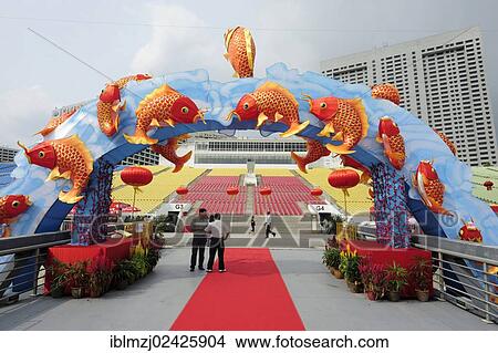 Picture - "Goldfish in an arch, colourful decorations for the Chinese New Year celebrations, Marina Bay Floating Stadium, Central Area, Central Business District, Singapore, Asia". Fotosearch