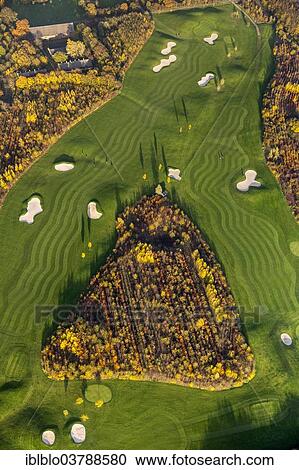 Stock Image - "Golf and More Duisburg, golf course, at Remberger See lake, aerial view, Huckingen, Duisburg, Ruhr area, North Rhine-Westphalia, Germany, Europe". Fotosearch