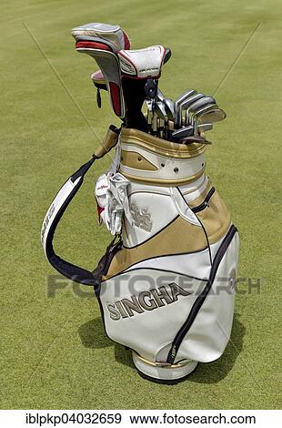 "Golf bag with clubs on the green, Hua Hin, Thailand, Asia" View Large Photo Image Stock Photo - "Golf bag with clubs on the green, Hua Hin, Thailand, Asia". Fotosearch