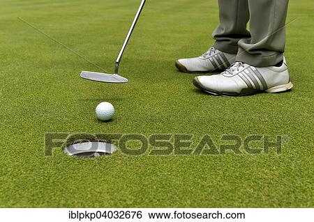 "Golfer putting, Hua Hin, Thailand, Asia" View Large Photo Image Stock Photograph - "Golfer putting, Hua Hin, Thailand, Asia". Fotosearch